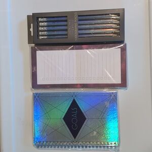 Me to We notepads and pencils